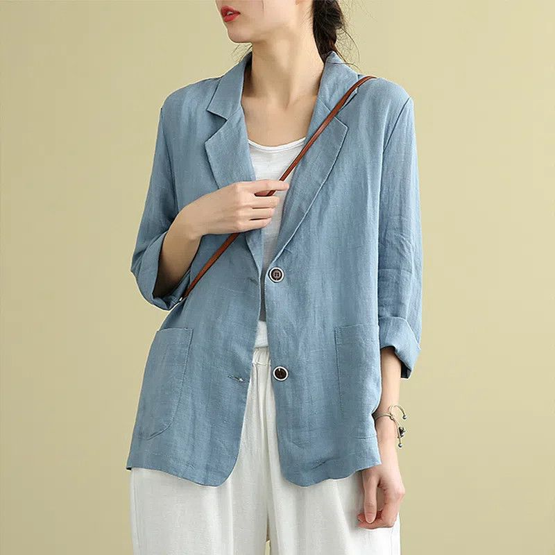 Chic women's tailored linen blazer, lightweight & versatile. Perfect for smart casual or professional spring/summer outfits.