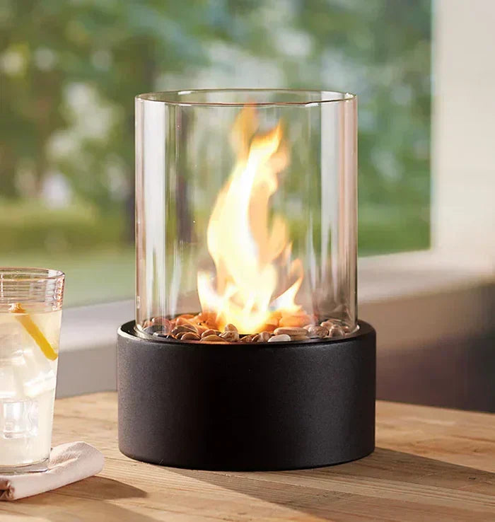 Modern steel & borosilicate glass gas lantern, perfect for elegant patio lighting and indoor decor.