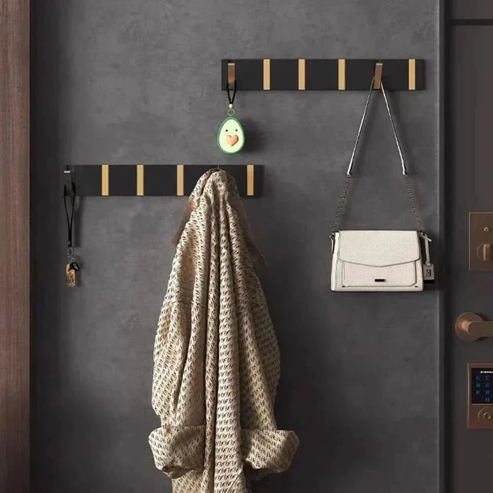 Collapsible wall hook for entryway coats, hats, & bags. Space-saving modern aluminum design.