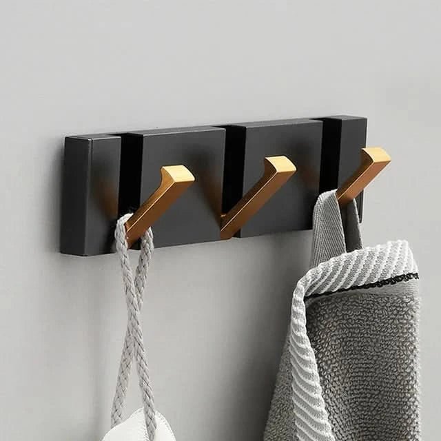 Space-saving folding wall hook for bathroom towels & robes. Modern aluminum, easy to install.