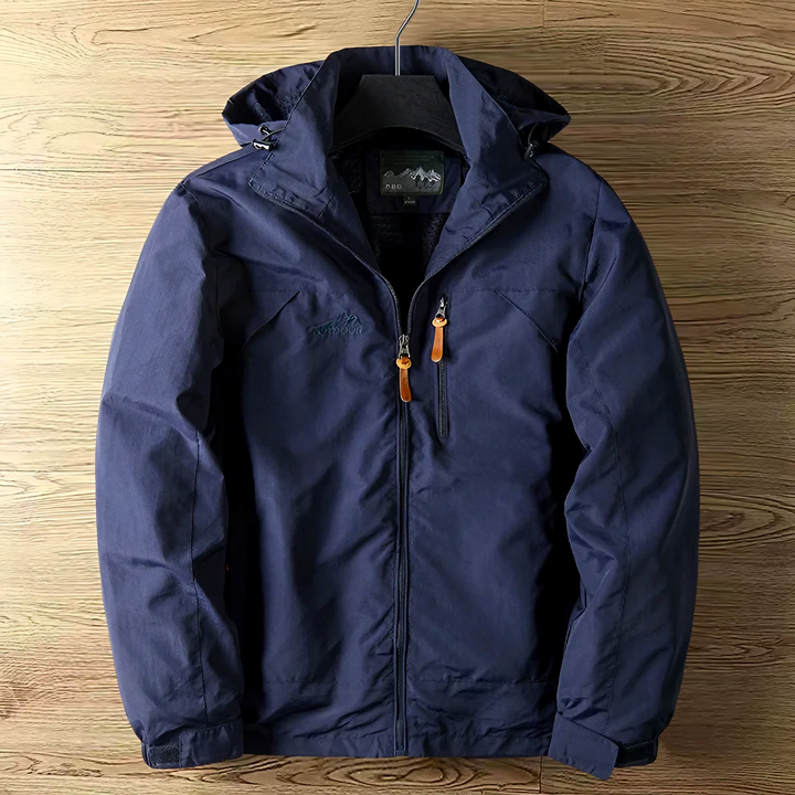 Model in a unisex lightweight hooded jacket for hiking & outdoor activities. Breathable, windproof, rainproof.