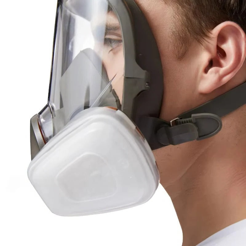Full face respirator mask with anti-fog lens and secure silicone seal for ultimate dust & chemical protection.