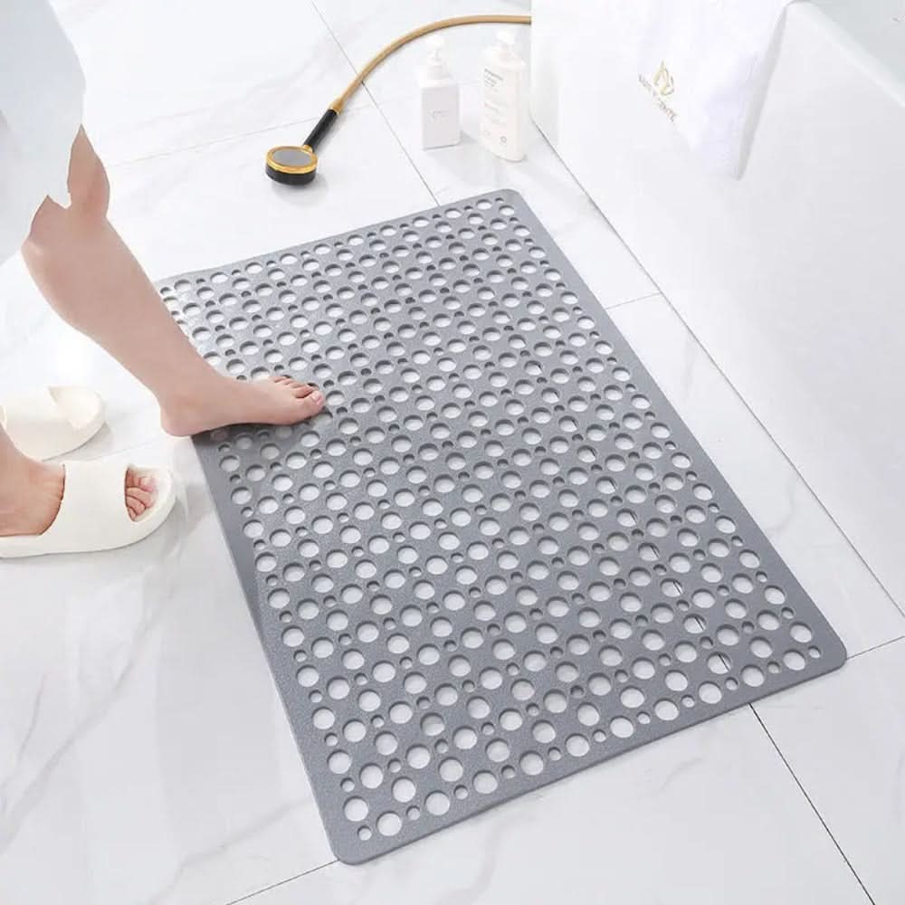 Stylish rectangular anti-slip shower mat enhances home decor & bathroom safety. Hygienic, durable PVC.