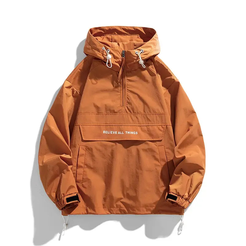 Modern men's beige windbreaker jacket. Half-zip, lightweight outerwear for casual all-weather comfort.