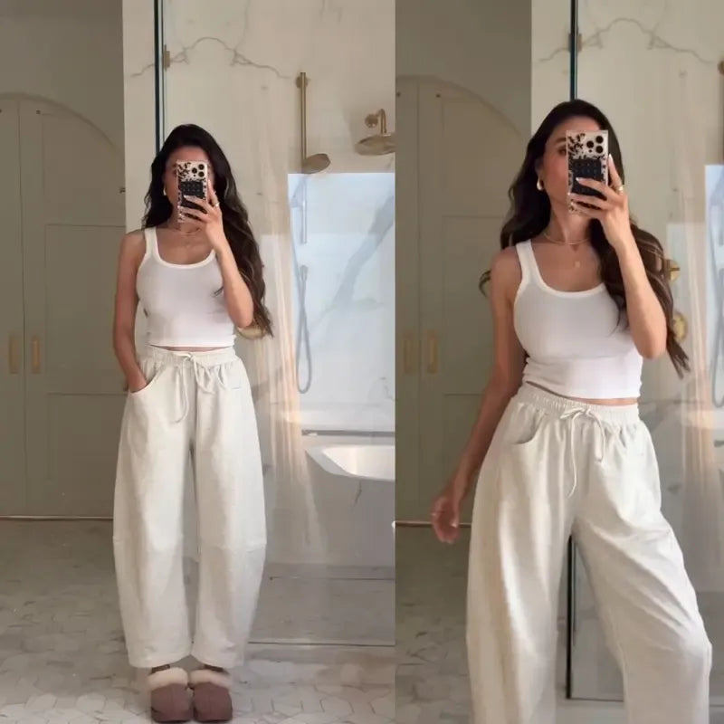 Chic barrel-leg women's trousers, comfortable and elegant for versatile modern everyday wear.