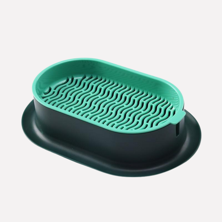 Indoor cat grass growing kit, green plastic planter with fresh pet greens for feline enrichment.