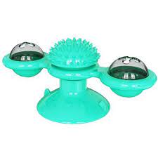 Close-up of a durable plastic interactive cat carousel toy with rolling balls inside the track.