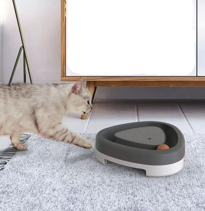 Interactive cat toy with circular ball track and corrugated scratch pad for feline enrichment, mental stimulation