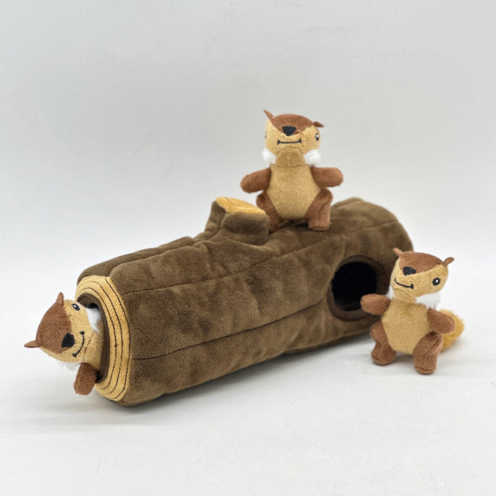 Interactive dog toy with plush brown tree trunk and six squeaky squirrel hide-and-seek puzzles
