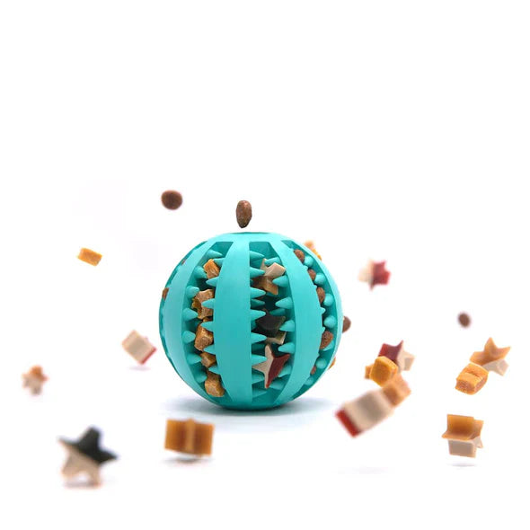Green interactive treat dispensing chew ball for dogs, promoting healthy teeth and gums.