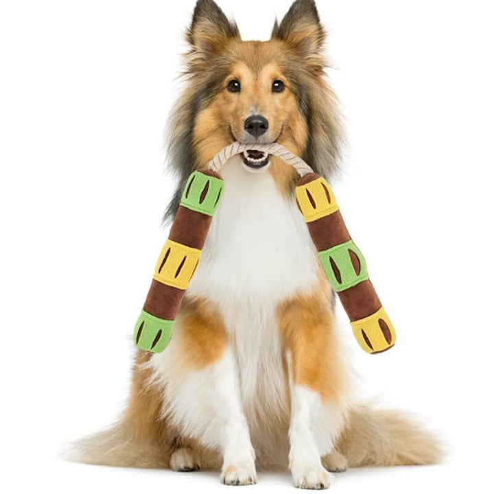 Interactive puzzle treat dispenser squeaky dog toy for mental stimulation and enrichment.