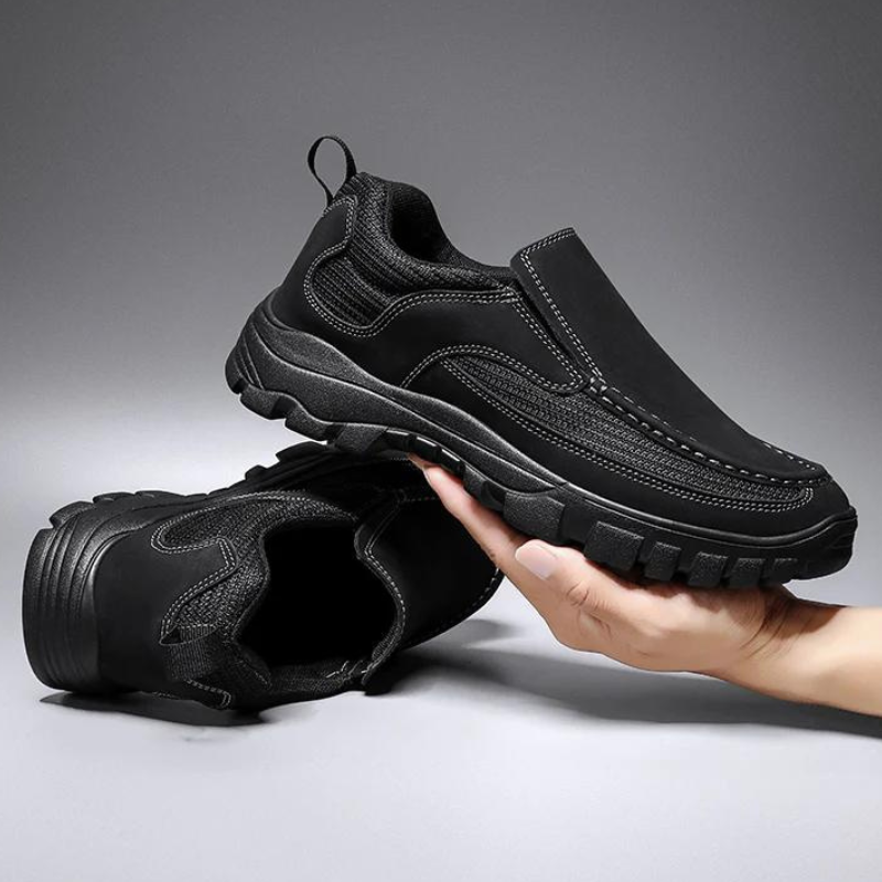 Close-up of men's genuine leather slip-on loafers, showcasing breathable design & durable craftsmanship. Casual.