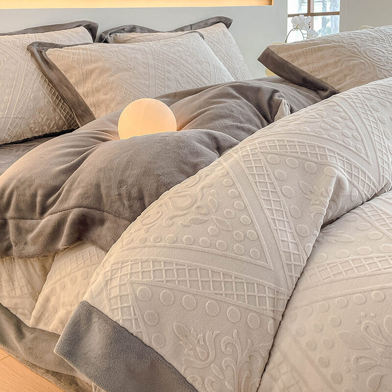 Bedroom decor featuring a bed made with a plush, double-sided jacquard velvet sheet set.