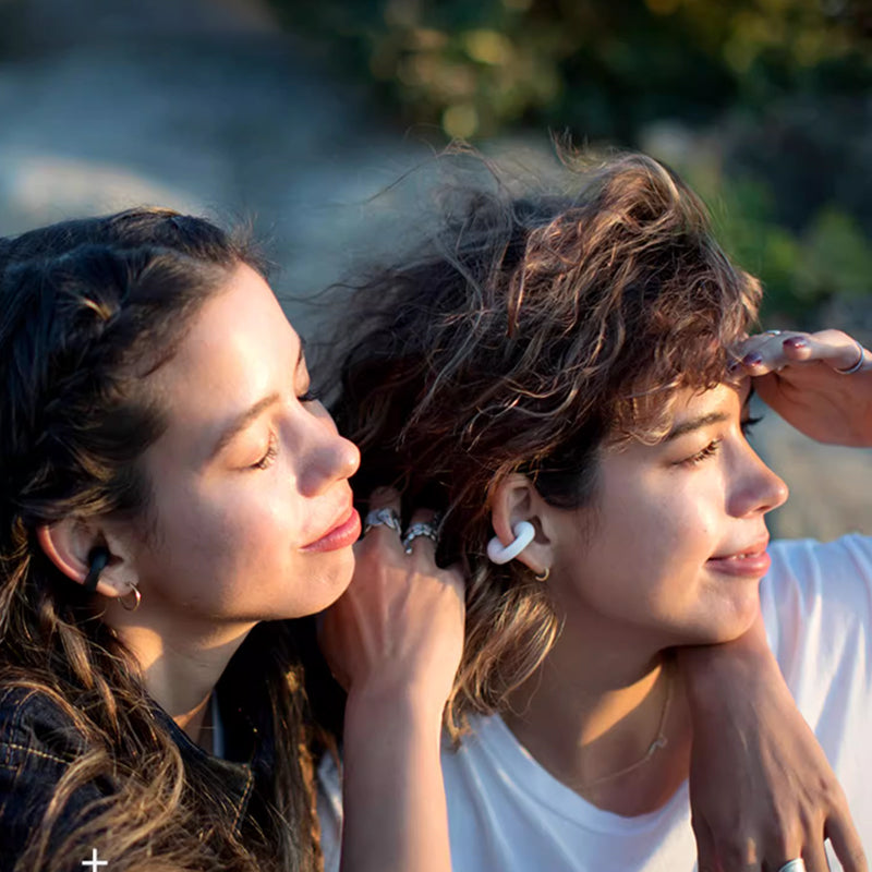 "Kabelloses Bluetooth Sport-Headset, ergonomisch, wasserfest, Schwarz oder Weiß, ideal für Training und Klanggenuss"