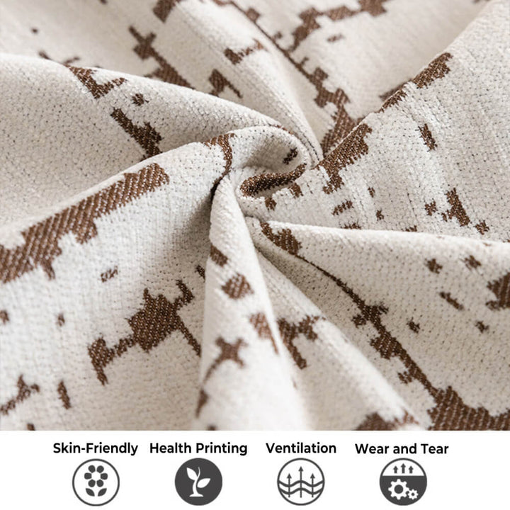 Detailed view of a thick chenille throw, providing anti-scratch protection for furniture