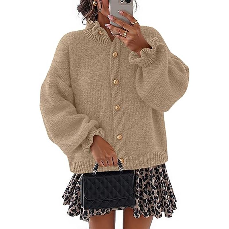Fashionable women's button-front cardigan. Long sleeve, chic style, ideal elegant outerwear for seasonal wear.