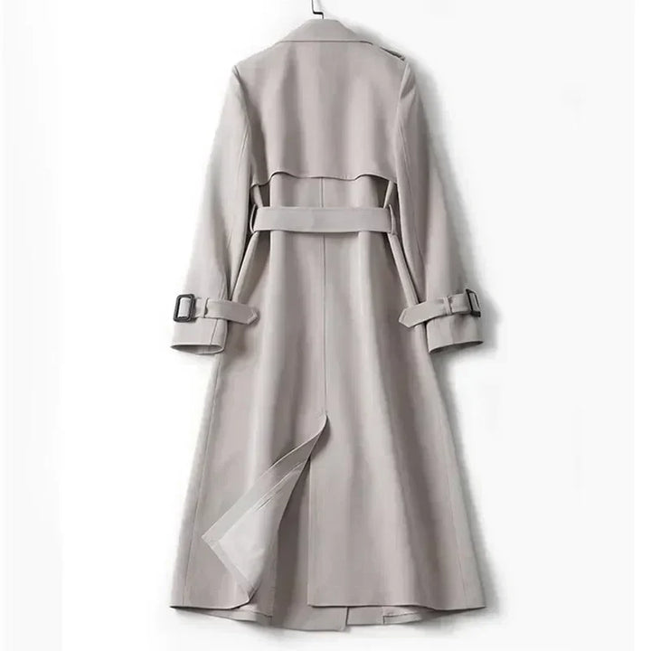 Klassischer Damen Trenchcoat in Beige, wasserdicht, zeitloses Design, ideal für wechselnde Witterungen und elegante Anlässe.