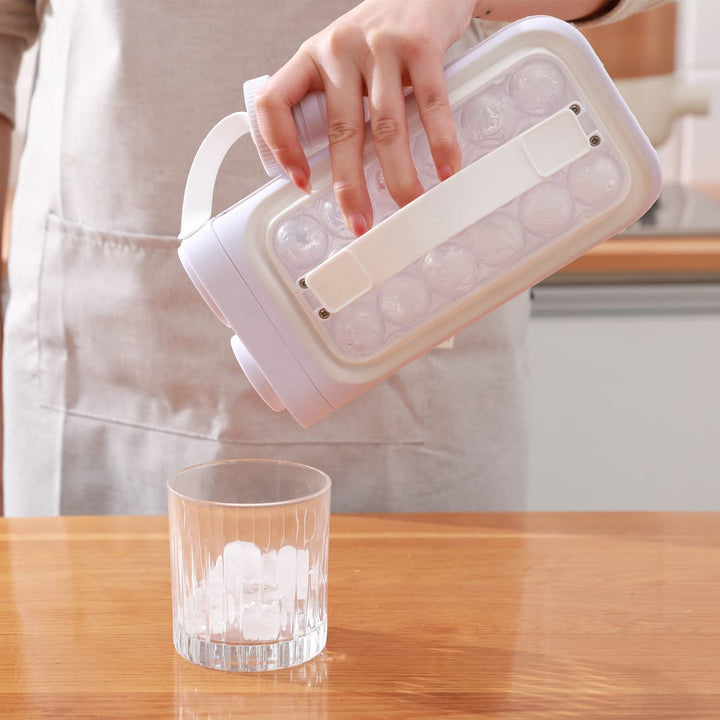 "Kompakte Eiswürfelmaschine mit schneller Eisproduktion, robustem transparentem Gehäuse, ideal für Küchen und Bars."