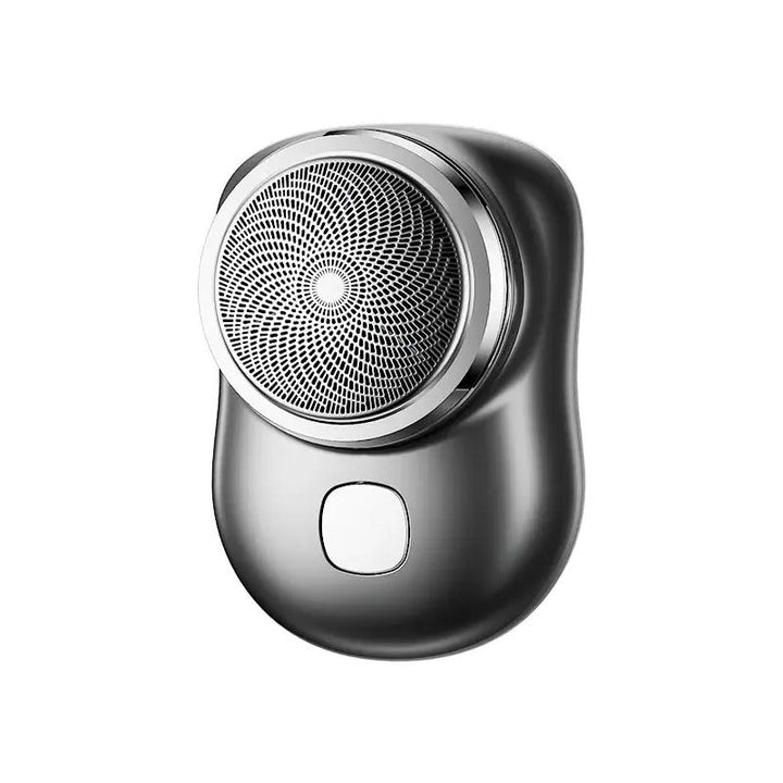 "Kompakter, kabelloser Herrenrasierer mit ergonomischem Design, ideal für präzise und sanfte Körperpflege unterwegs."