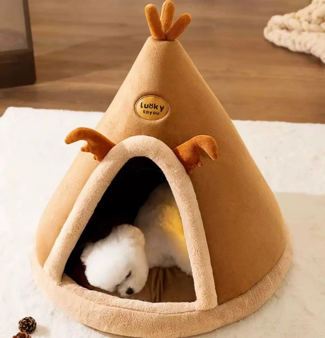 "Kuschelhöhle für Haustiere im Tipi-Design, weiche Polsterung, wärmespeichernd, gemütlicher Rückzugsort für Hunde und Katzen.