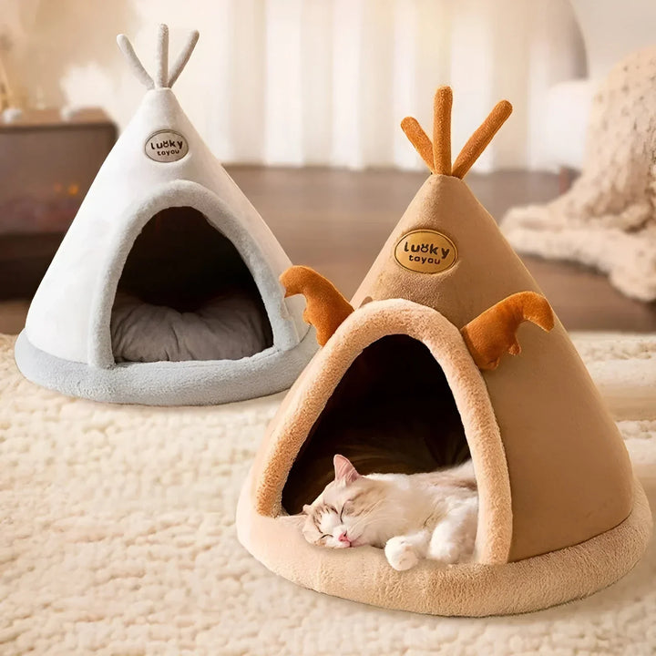 "Kuschelhöhle für Haustiere im Tipi-Design, weiche Polsterung, wärmespeichernd, gemütlicher Rückzugsort für Hunde und Katzen.