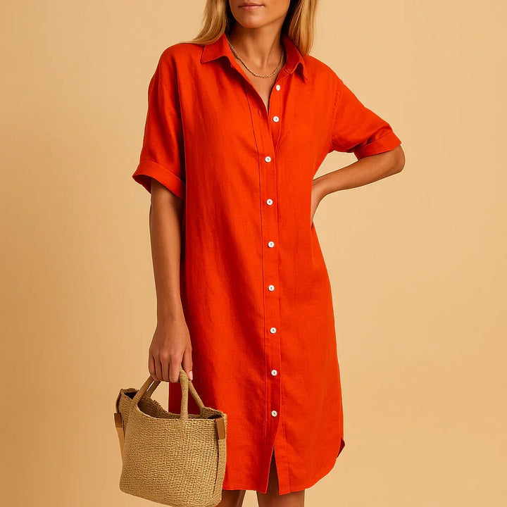 Effortless women's relaxed fit button-down shirt dress, short sleeve, great for versatile spring & summer fashion.