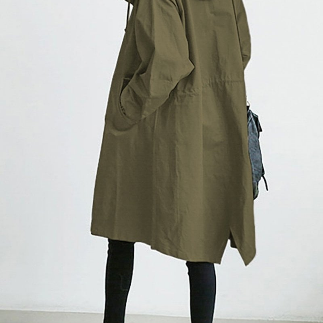 "Langer, eleganter Damen-Trenchcoat, wasserdicht, mit stilvoller Passform in Beige. Ideal für Wintermode und schlechte Wetter