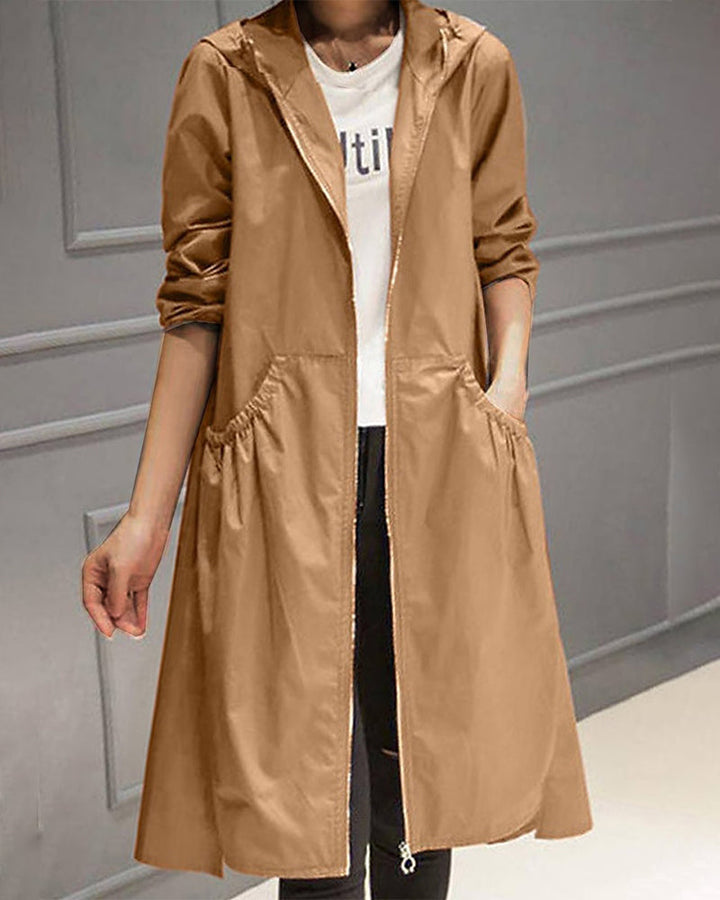 Langer, wasserfester Damen-Trenchcoat mit Kapuze, unifarben, ideal für Herbst/Winter, elegant und funktional.