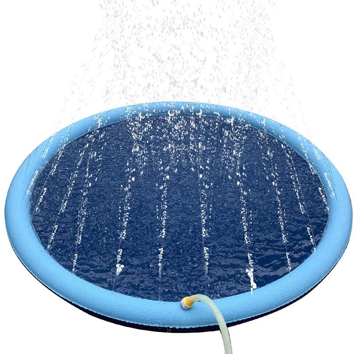 Top-down view of a round blue pet splash pad with active water fountains, designed for pet agility and summer cooling.