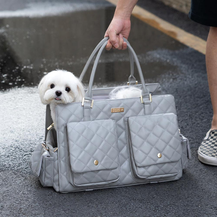 Portable pet travel bag, grey, with a detachable shoulder strap and padded handle for comfort