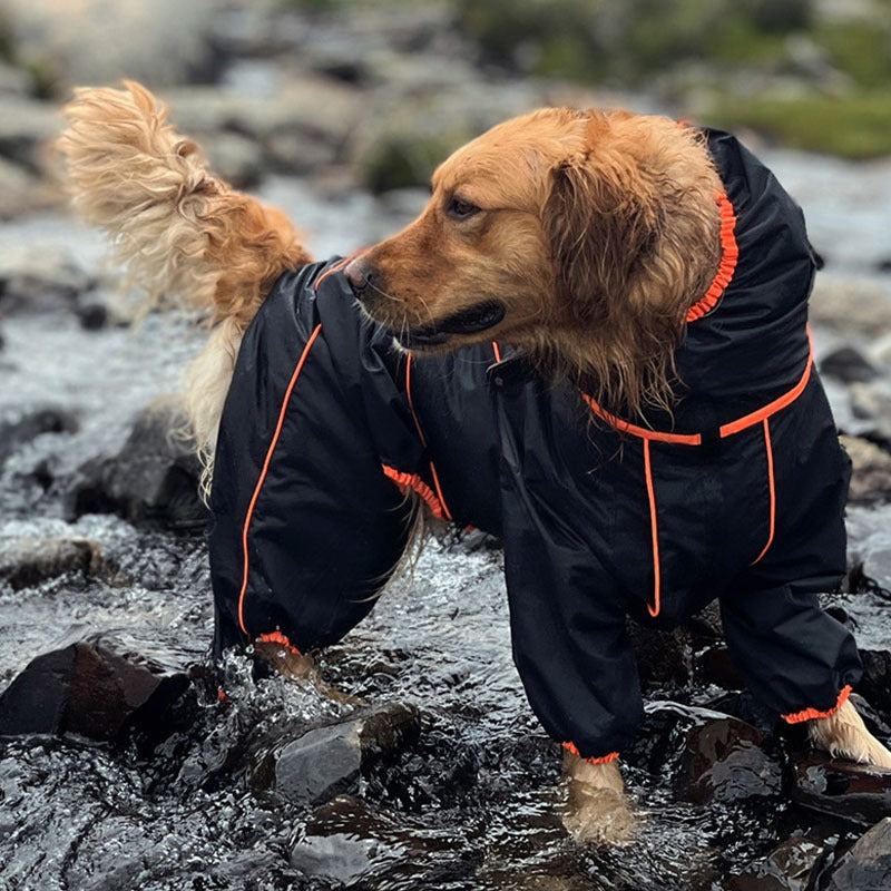 Large waterproof dog raincoat in red, adjustable for unisex pets, with reflective strips for safety.