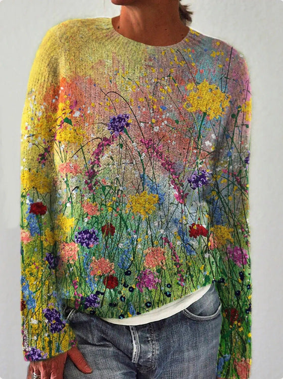 Lebendiger Damenpullover mit floraler Stickerei, auffällige Farben, gemütliche Passform, ideal für modische Frauen.
