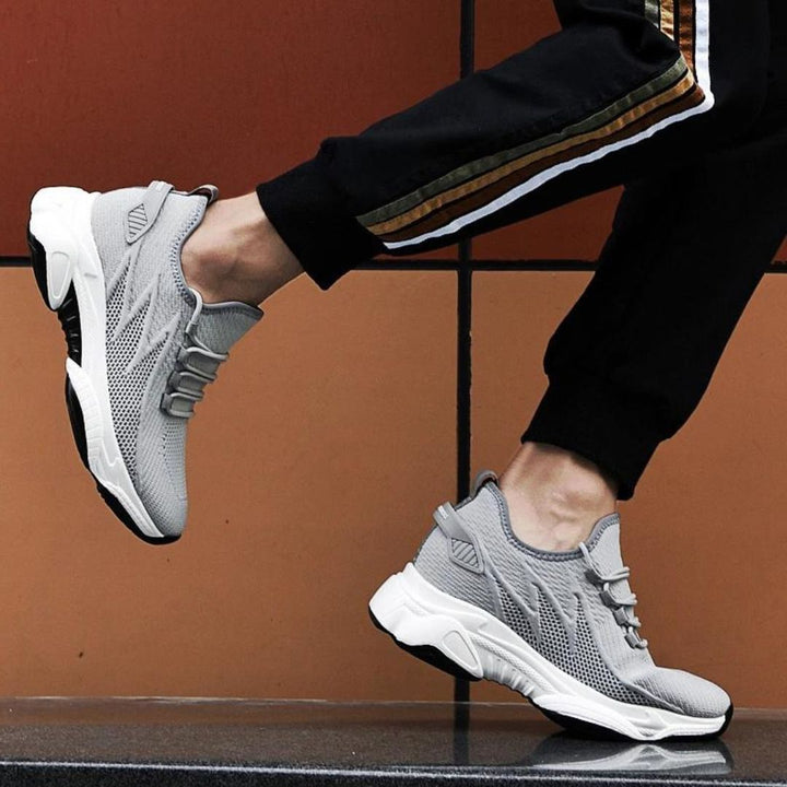 "Leichte, atmungsaktive Herren-Sportschuhe Paul in elegantem Design für Komfort beim Laufen und Training."