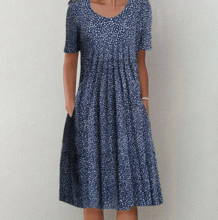 "Leichtes Damen Sommerkleid mit lebhaften Drucken, Midi-Länge, ideal für warme Tage und modische Auftritte."
