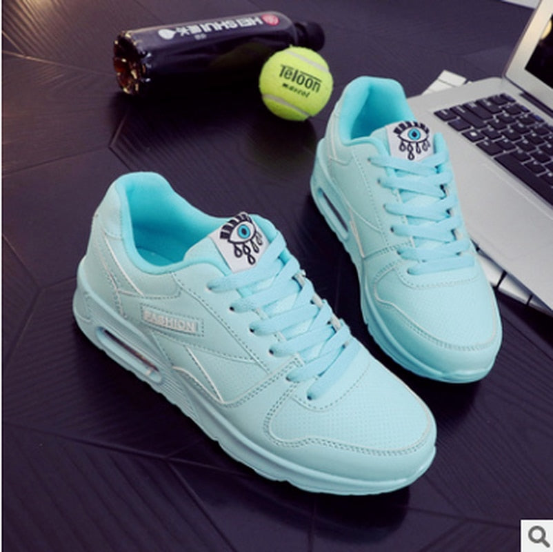 Light blue women's platform sneakers, stylish vegan leather for all-day comfort & casual wear.