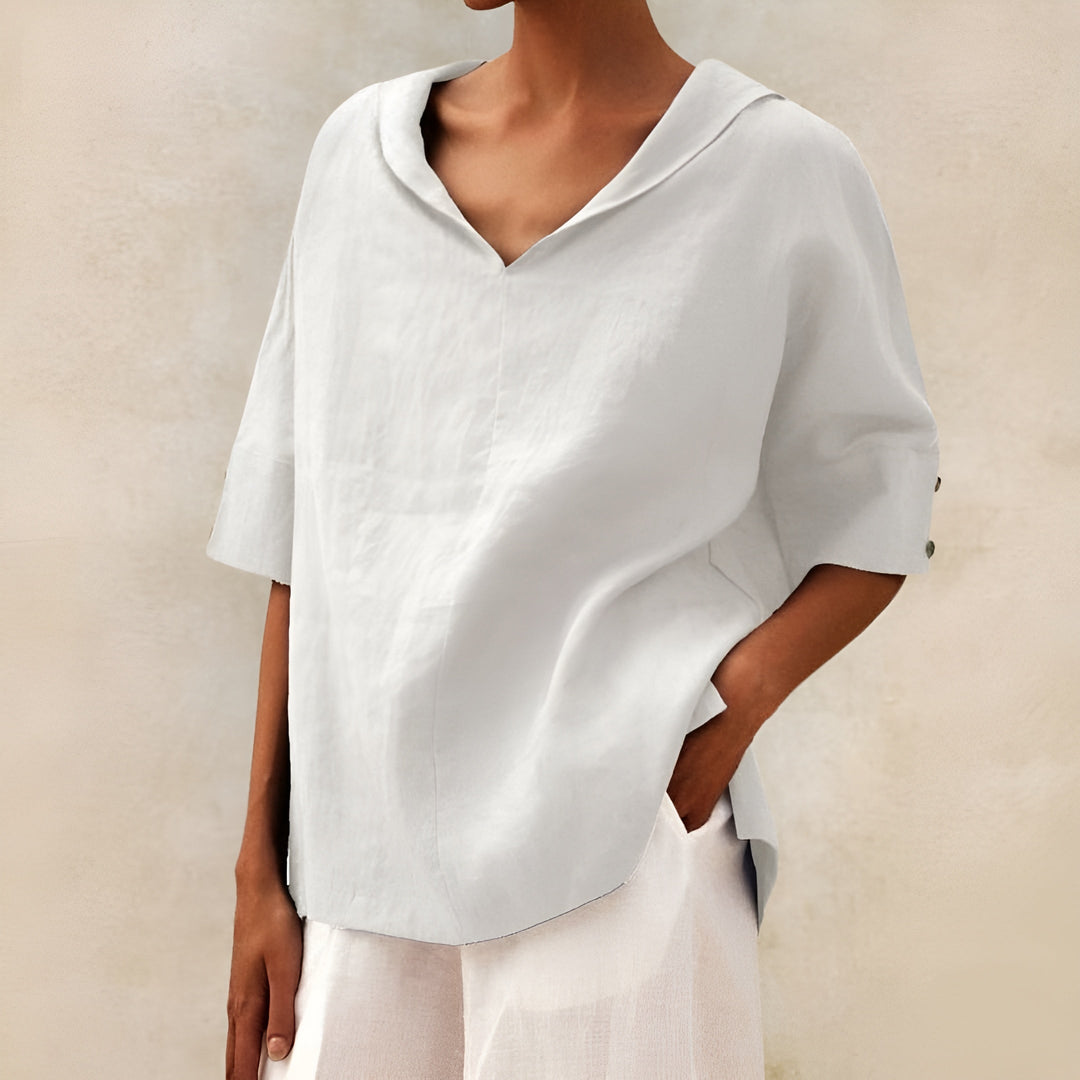 Lightweight short sleeve women's blouse for casual everyday wear. Relaxed fit summer top, comfortable fashion.