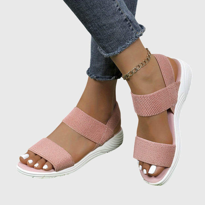 Lightweight women's orthopedic sandals, designed with adjustable arch support for all-day comfort.