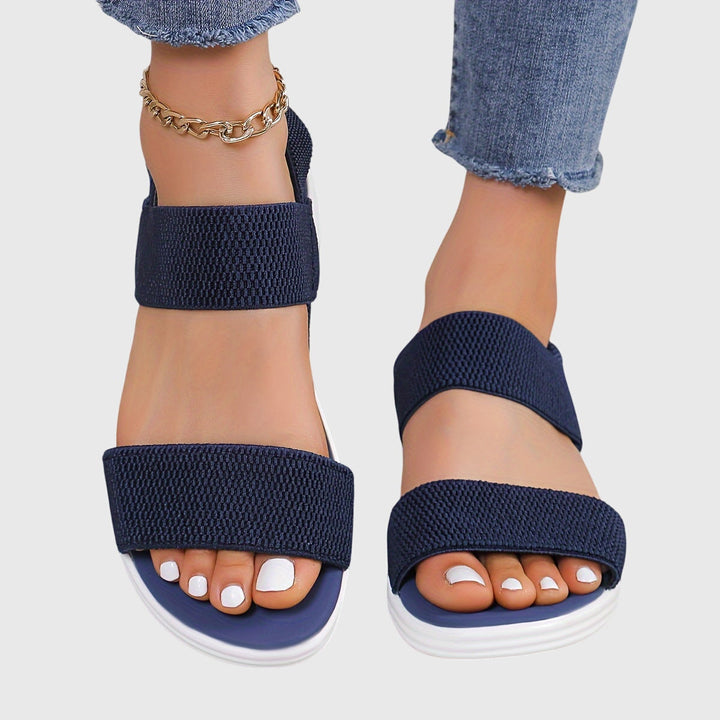 Orthopedic women's sandals, providing adjustable arch support and comfortable design for summer.