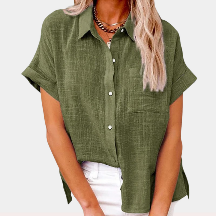 Chic women's short sleeve blouse, ideal for summer fashion, featuring a relaxed fit & button front.