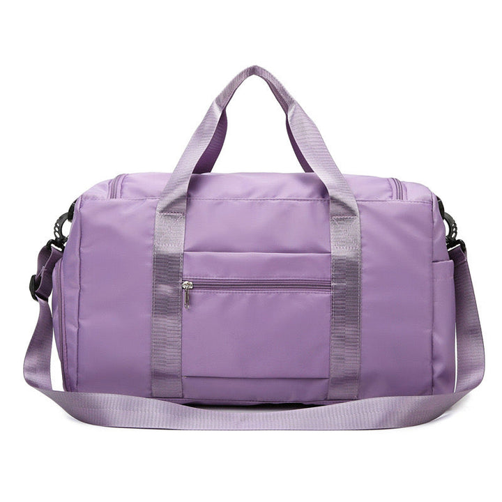 "Lila Damen-Reisetasche mit Schuhfach und mehreren Taschen, ideal für Reisen und Sport, robust und wasserdicht."