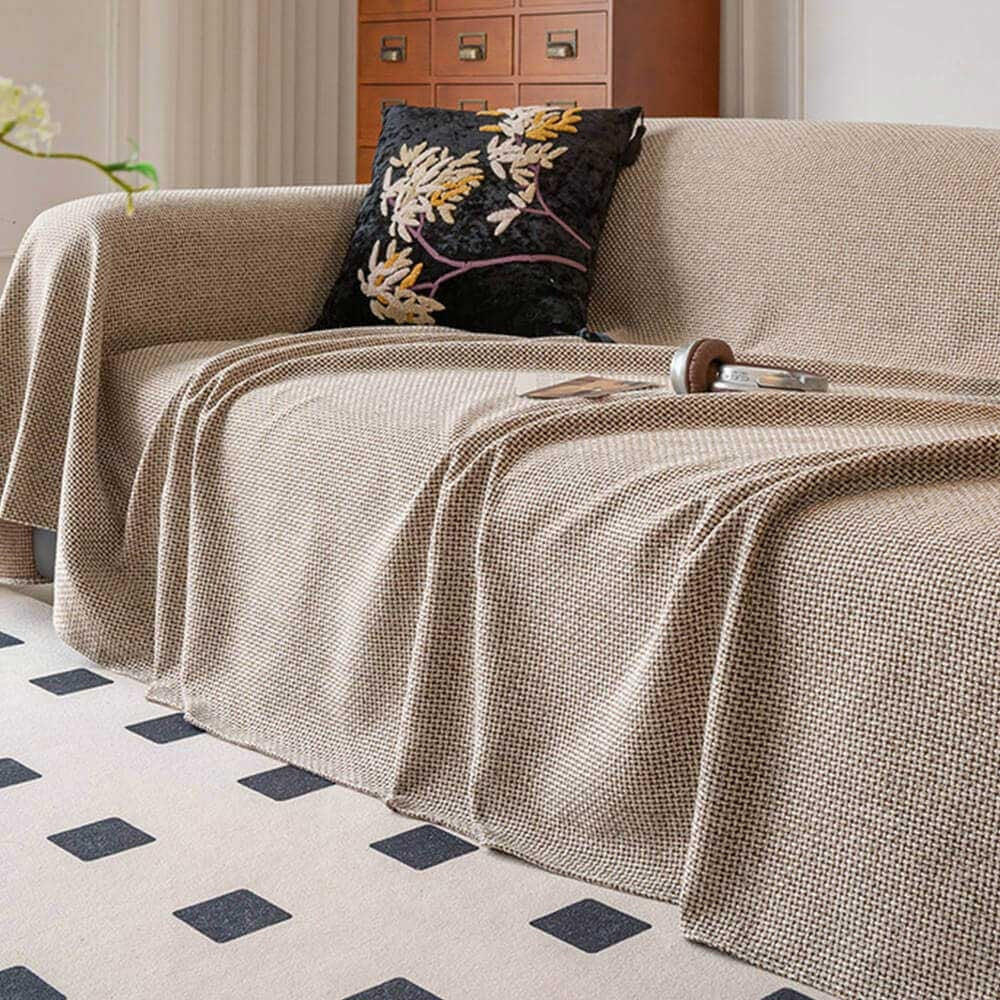 Close-up of reversible linen-look sofa cover fabric, highlighting its scratch-resistant texture