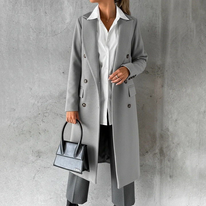 Warm ladies' long winter coat, double-breasted design for classic style and elegant outerwear in fall & winter.