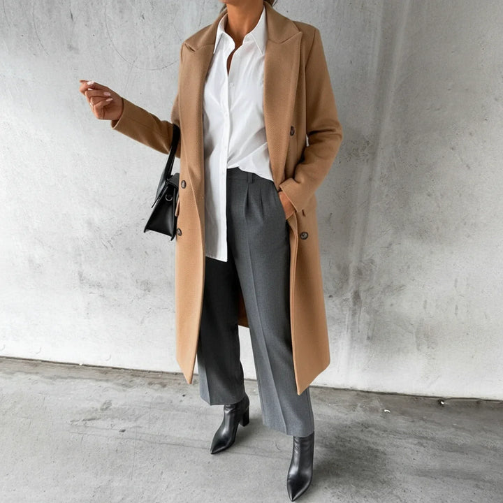 Chic women's double-breasted long winter coat featuring a stylish notch lapel, ideal for elegant fall fashion.