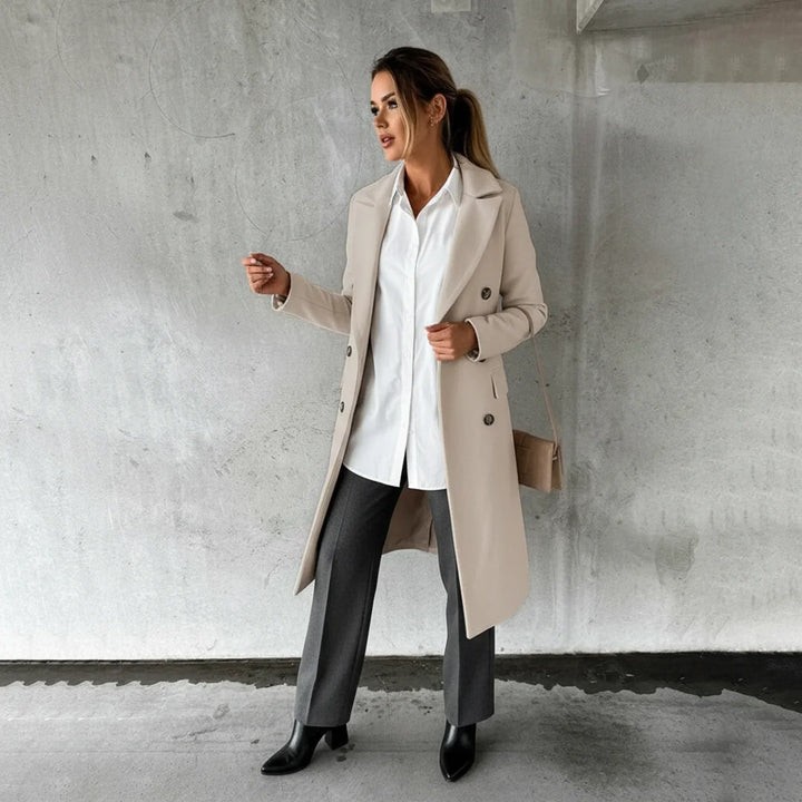 Classic women's double-breasted long winter coat, warm and elegant, suitable for various fall fashion looks.