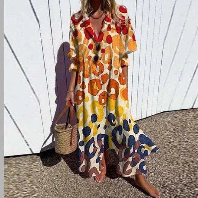 "Luftiges Boho-Maxikleid mit V-Ausschnitt, bunte Muster, ideal für Sommer, vielseitig und bequem für jeden Anlass."