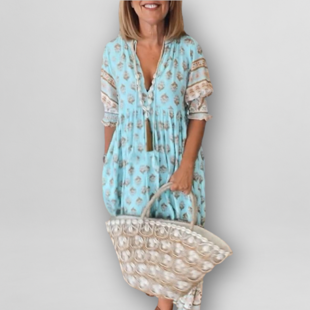 "Luftiges Sommerkleid mit floralem Muster, Altrosa/Hellblau, lockerer Schnitt, L-3XL, ideal für warme Tage."