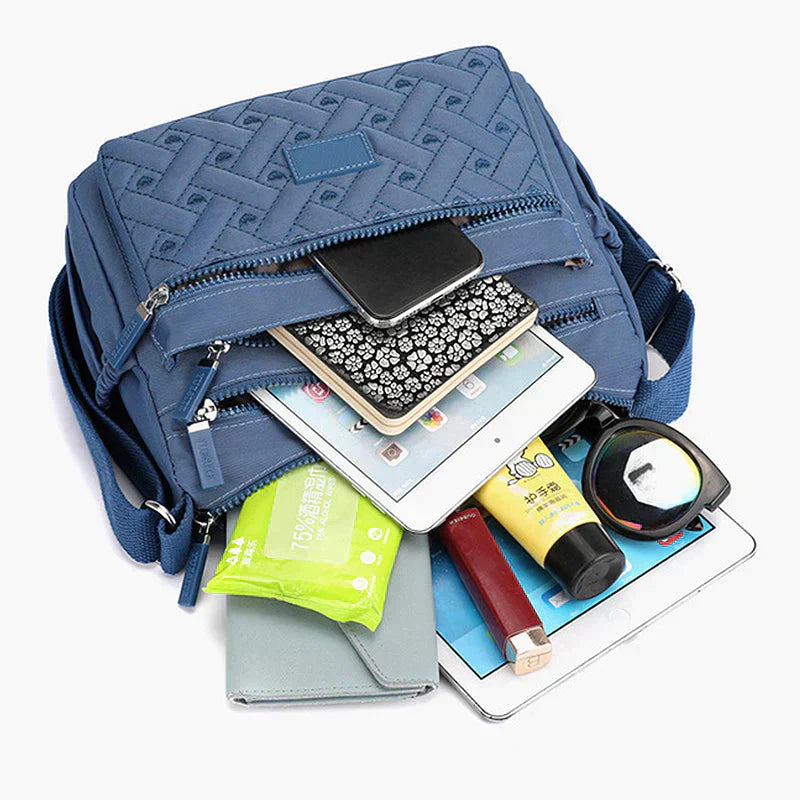 Luxuriöse Damen Umhängetasche in Schwarz mit verstellbarem Gurt, mehreren Fächern, ideal für Alltag und besondere Anlässe.