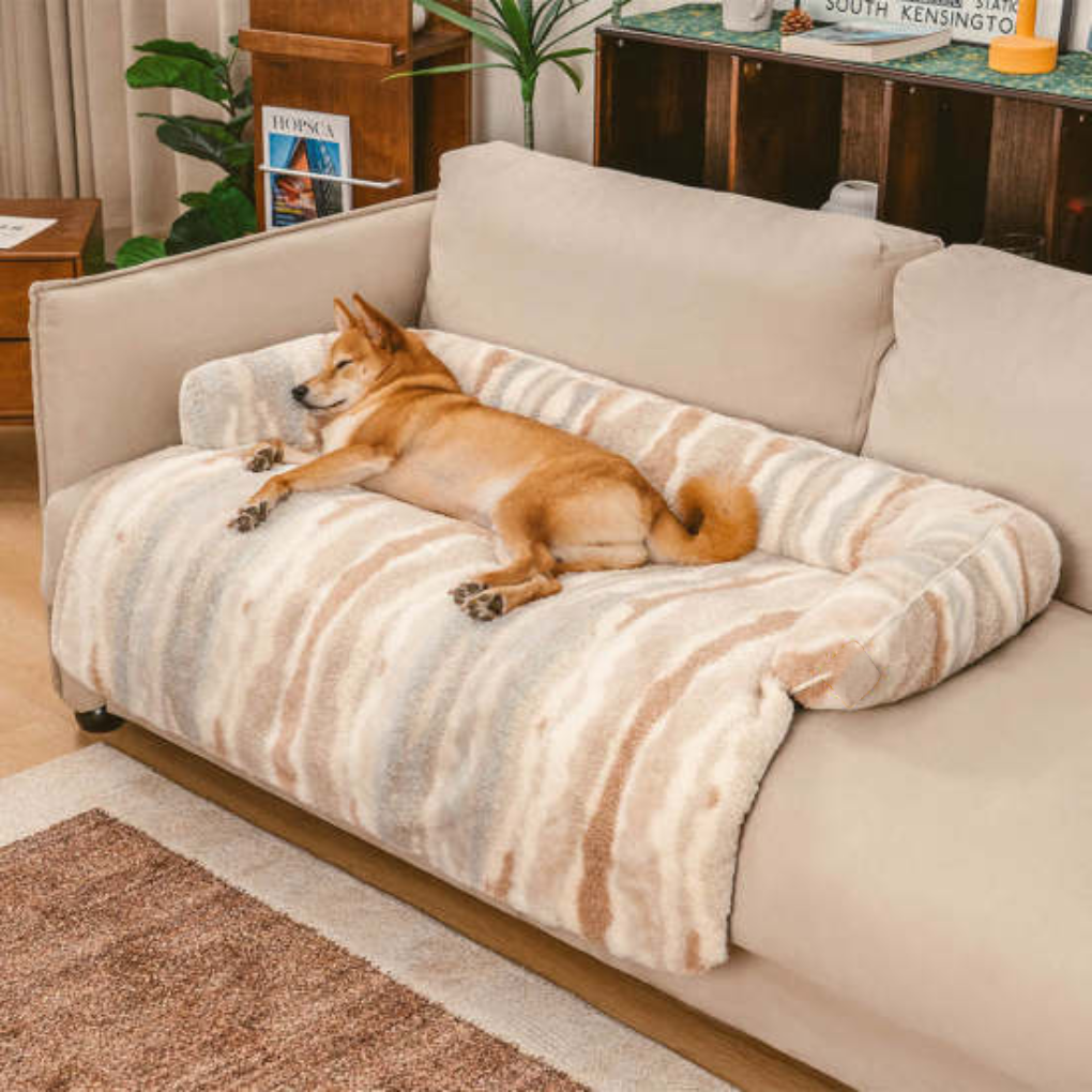 Elegant Nordic style plush pet protector mat on a sofa, providing a cozy dog bed and keeping furniture clean