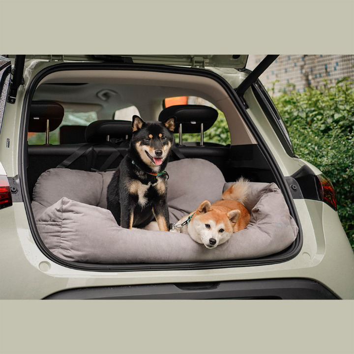 Luxury dog car travel bed for ultimate pet comfort & safety on long journeys.
