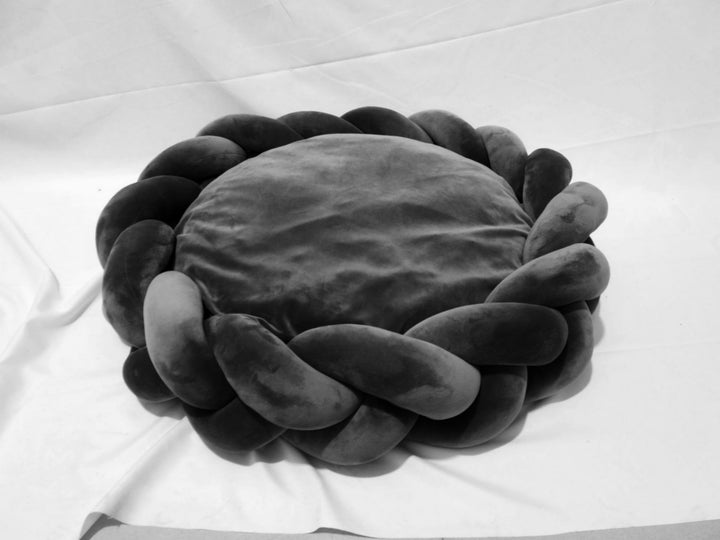 Eco-friendly luxury dog bed, made with sustainable materials, featuring a removable and washable cover.